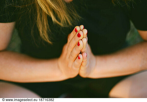 Woman practising yoga outdoors