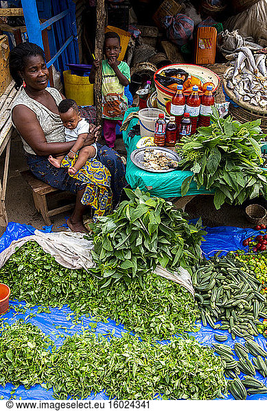 Woman selling vegetables at kpalime market  togo