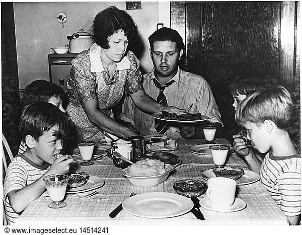 Woman Serving Family Dinner  1955  From the Documentary Film  Emerging Woman  Women's Film Project  1974