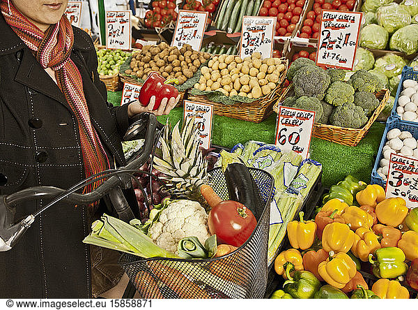 woman shopping at local produce market