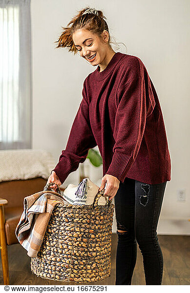 Woman Smiles and Holds Basket