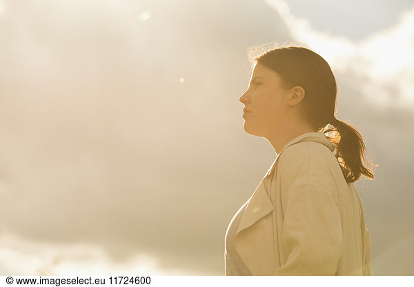 Woman standing against sky
