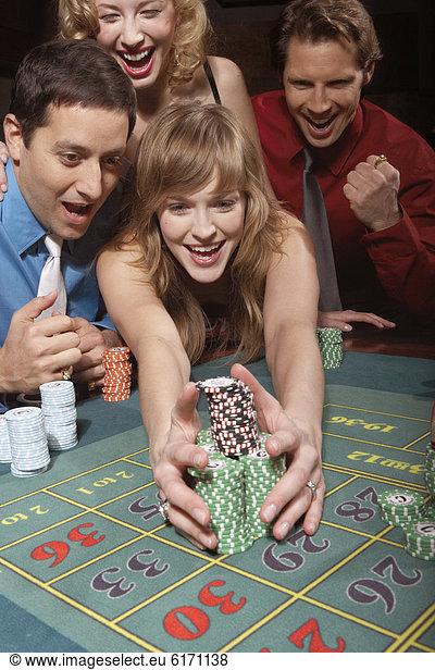 Woman successfully gambling in a casino