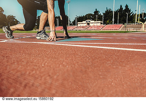 woman training at outdoor track
