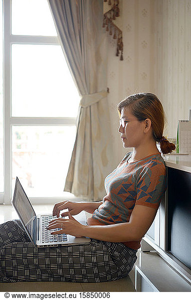 Woman use computer laptop for work from home