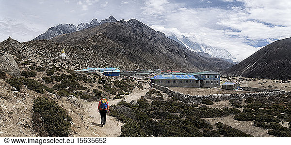 Woman walking in Dinboche  Himalayas  Solo Khumbu  Nepal