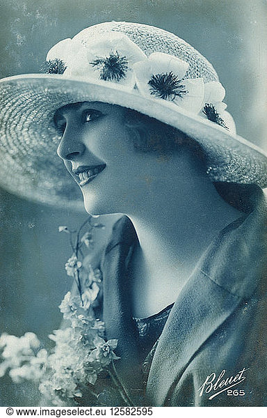 Woman wearing a hat  c1910s-c1920s(?).Artist: Bleuet