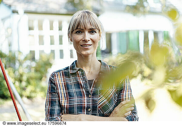 Woman with bangs in garden