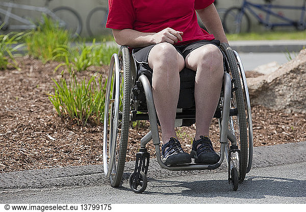 Woman with degenerative hip in a wheelchair