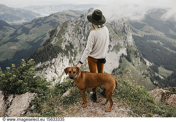 Woman with dog on viewpoint  Grosser Mythen  Switzerland