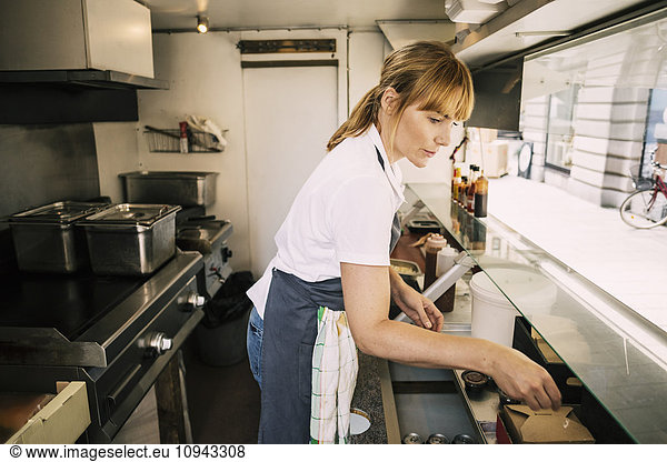 Woman working in food truck