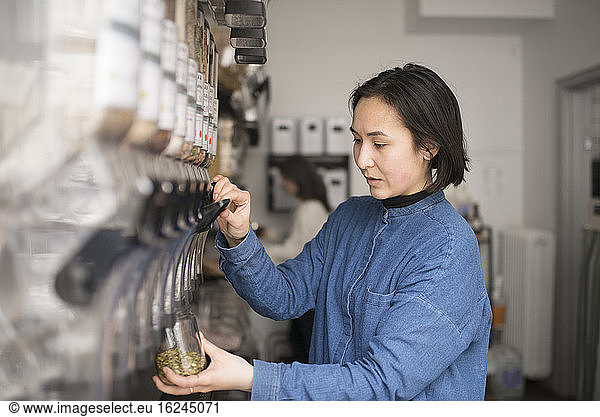 Woman working in organic shop