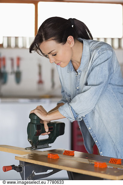 Woman working in workshop