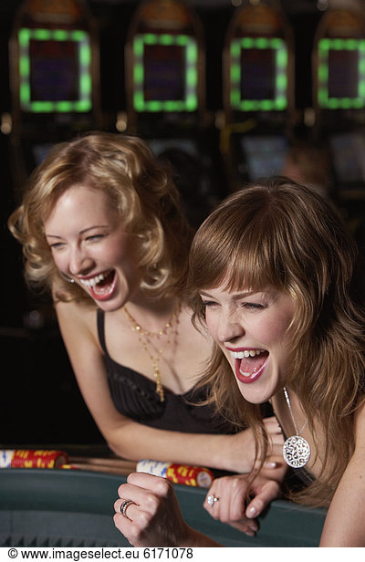 Women gambling at a casino