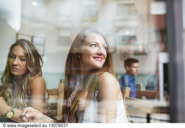 Women sitting inside coffee shop