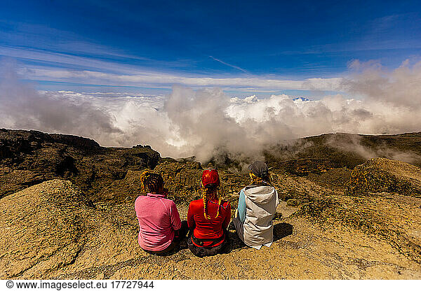 Women taking in the view on their way up Mount Kilimanjaro  UNESCO World Heritage Site  Tanzania  East Africa  Africa