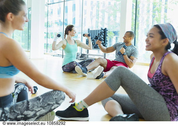 Women talking and resting at gym