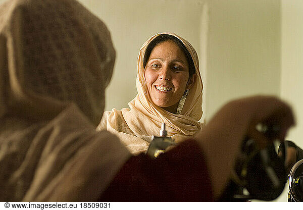 Women work as seamstresses in Kabul.
