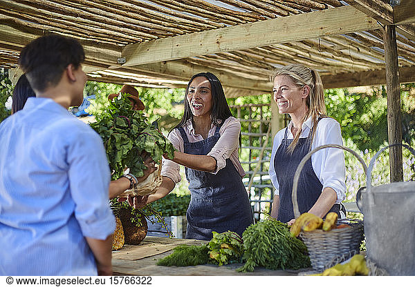 Women working at farmerâ€™s market