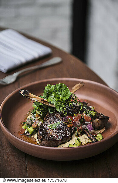Wood Grilled Lamb Chops with mint and mixed vegitables.