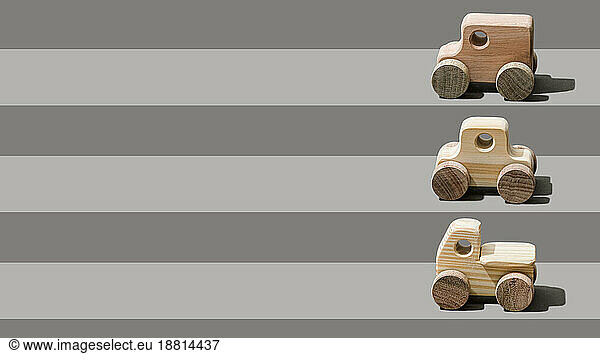 Wooden cars arranged in rows