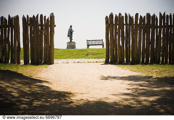 Wooden Fence And Statue Of John Smith