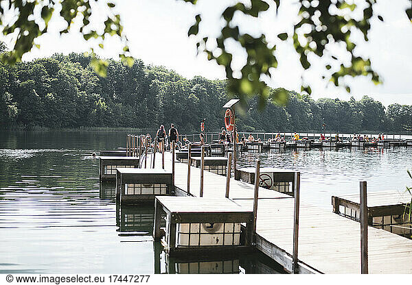 Wooden jetty on lake in Poland in summer