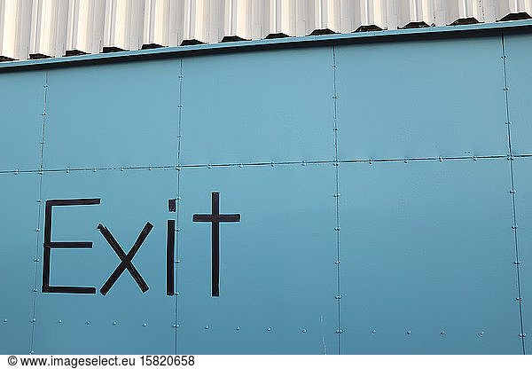 Word 'Exit' on facade of a storage