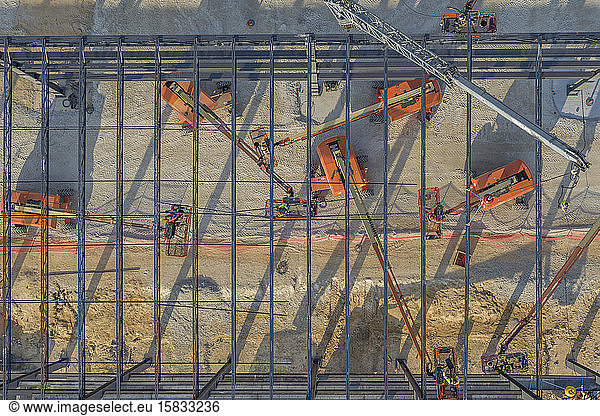 Workers constructing steel commercial building in Georgia