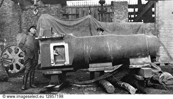 WORLD WAR I: BIG BERTHA. One of the German long-range heavy-mortar guns  known as 'Big Bertha ' at a repair shop at Danzig  Germany  following damage sustained from French aerial bombardment during World War I. Photographed c1915-18.