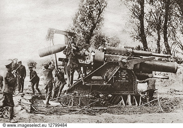 WORLD WAR I: HOWITZER. Canadian troops loading a howitzer. The gun's victory record is inscribed on its side. Photograph  c1916.
