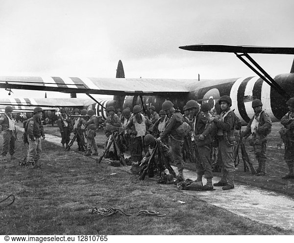 WORLD WAR II: AIR FORCE. Members of the 439th Troop Carrier Group await the signal to board a CF-4 glider to take part in the invasion of Normandy. Photograph  4 June 1944.