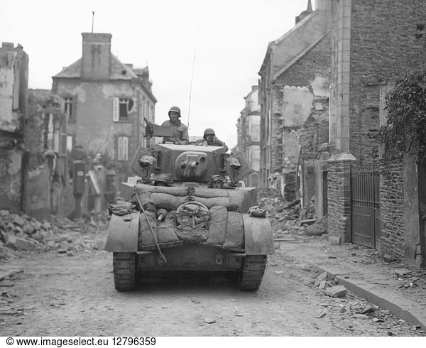 WORLD WAR II: NORMANDY. An American tank moving through liberated Saint-Lo  Normandy  France  July 20  1944.