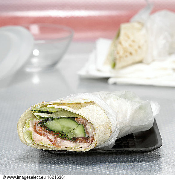 Wrap  filled with smoked salmon  close-up