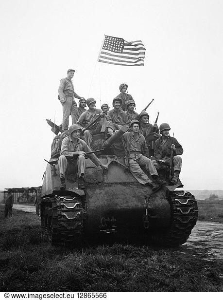 WWII: SASEBO  1945. A tank of the U.S. Marine Corps' Fifth Division arriving at the Sasebo Naval Base on Kyushu  Japan. Photograph  September 1945.