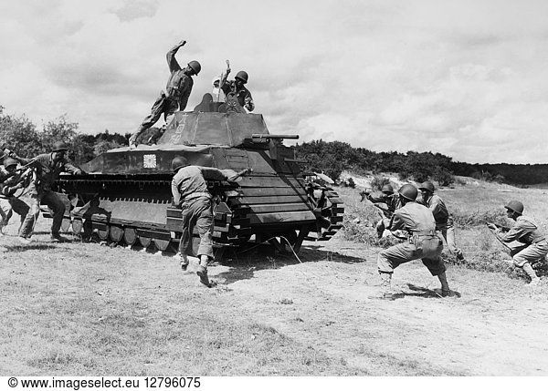 WWII: TRAINING  1942. Members of a U.S. Army tank destroyer unit demonstrating an attack at Camp Hood  Texas. Photograph  1942.