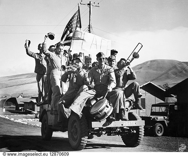 WWII: VICTORY PARADE  1945. Soldiers of the 5th Marine Division at Camp Tarawa in Hawaii  celebrating the news of Japan's surrender. Photograph  1945.