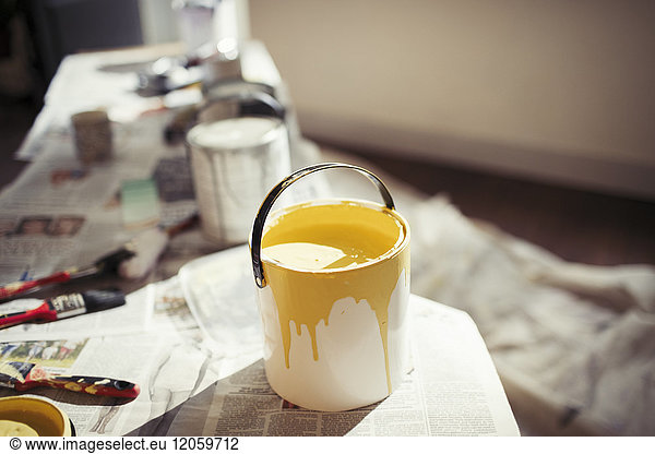 Yellow paint in paint can