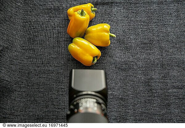 Yellow peppers and a Hasselblad 503 CW camera.