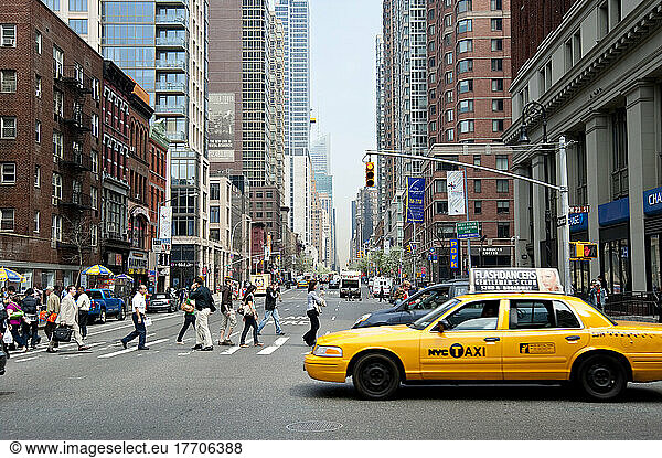 Yellow Taxi And Pedestrians Crossing The 6Th Avenue  Manhattan  New York  Usa