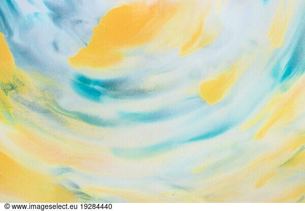 Yellow turquoise ink stain design texture backdrop