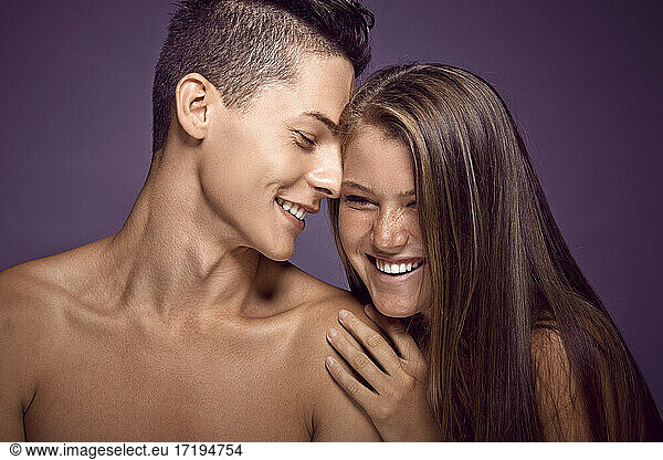 Young beauty teen couple sharing tender moments