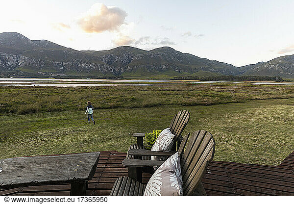 young boy exploring edge of lagoon Stanford  Western Cape  South Africa