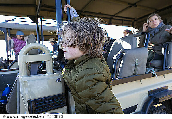 young boy in safari vehicle Okavango Delta  Botswana
