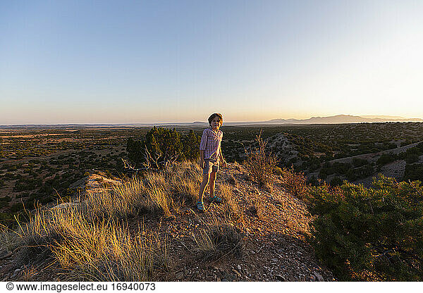 Young boy overlooking Galisteo Basin  Santa Fe