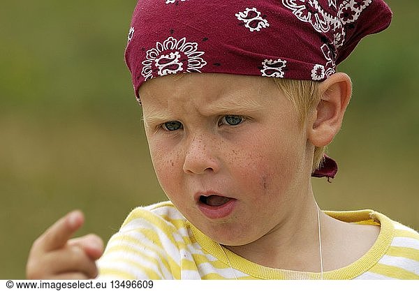 Young boy playing pirates