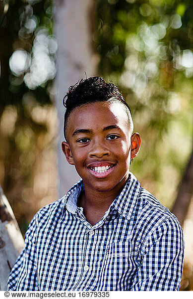 Young Boy Smiling for Camera