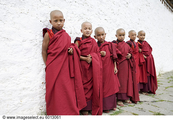 Young Buddhist monks  Karchu Dratsang Monastery  Bumthang  Bhutan  Asia