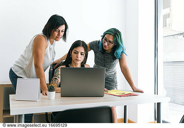 Young business women working in a coworking office