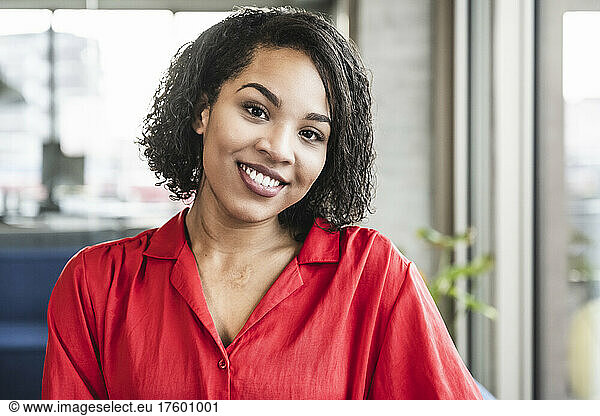 Young businesswoman smiling in office